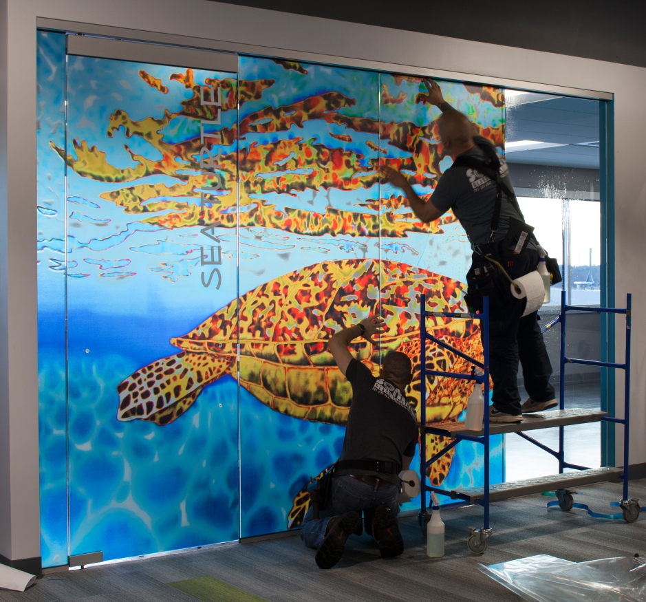 Jean-Baptiste Batik Silk Art reproduced into a glass wall art installation.